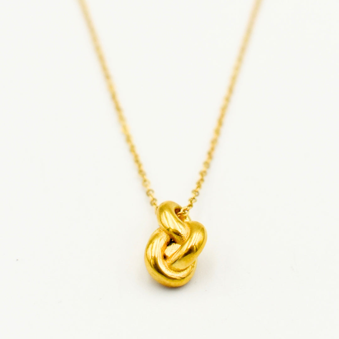 Gold Toned Knot Pendant 11112