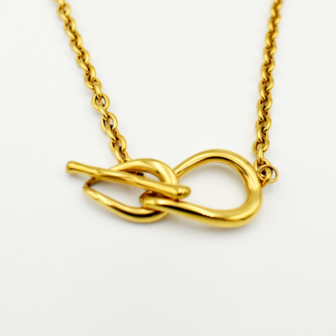 Gold Toned T-Cross Necklace