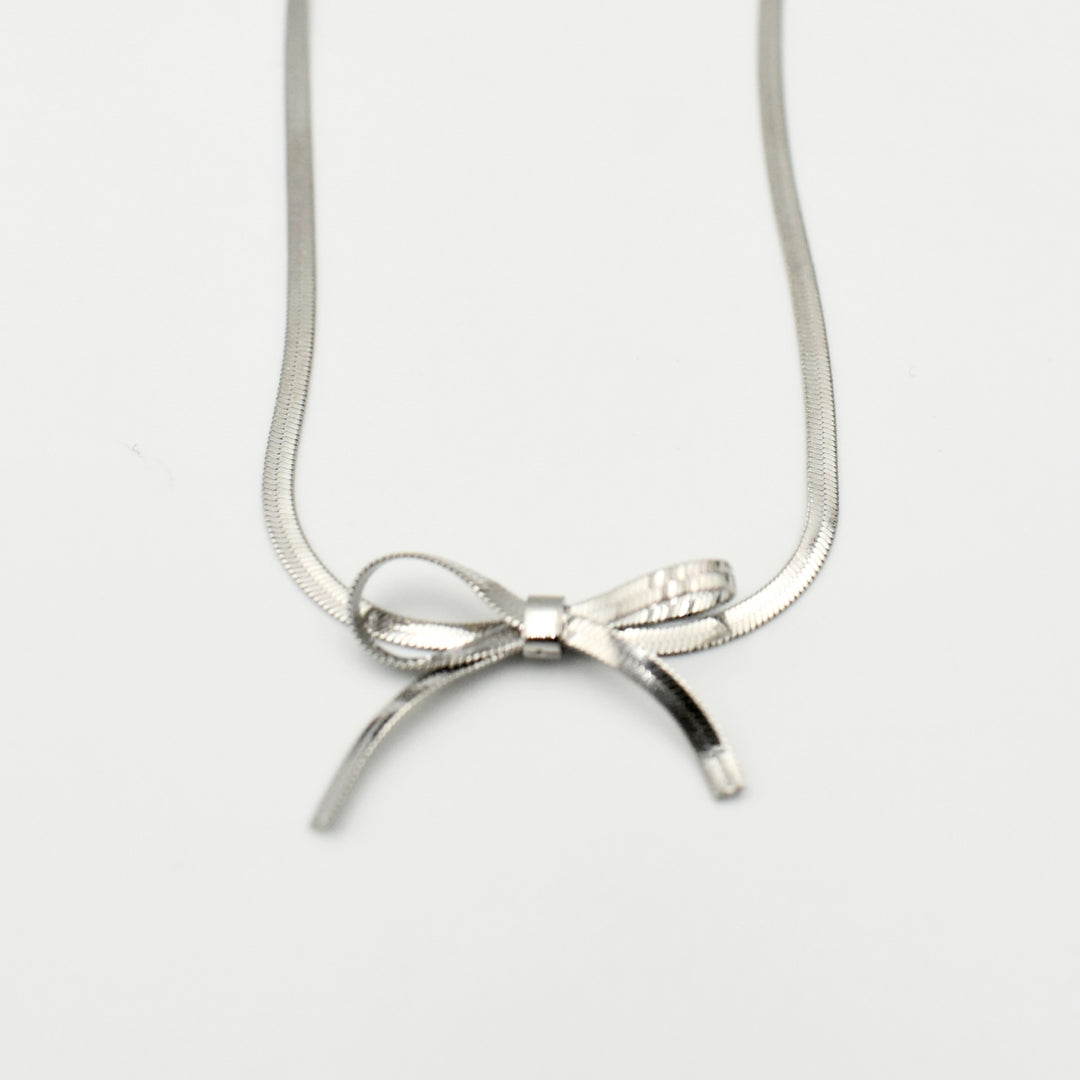 Rhodium Plated Knot Snake Bow Necklace