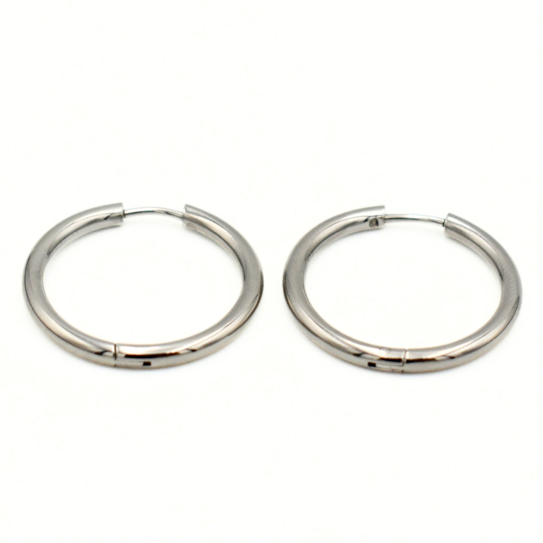 Rhodium Plated Smooth Medium Huggies