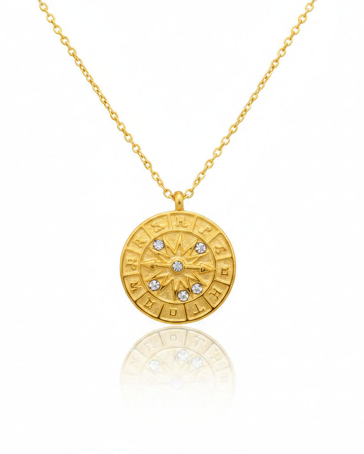 Gold plated waterproof compass pointer coin pendant necklace on link chain by Elli Jewellery