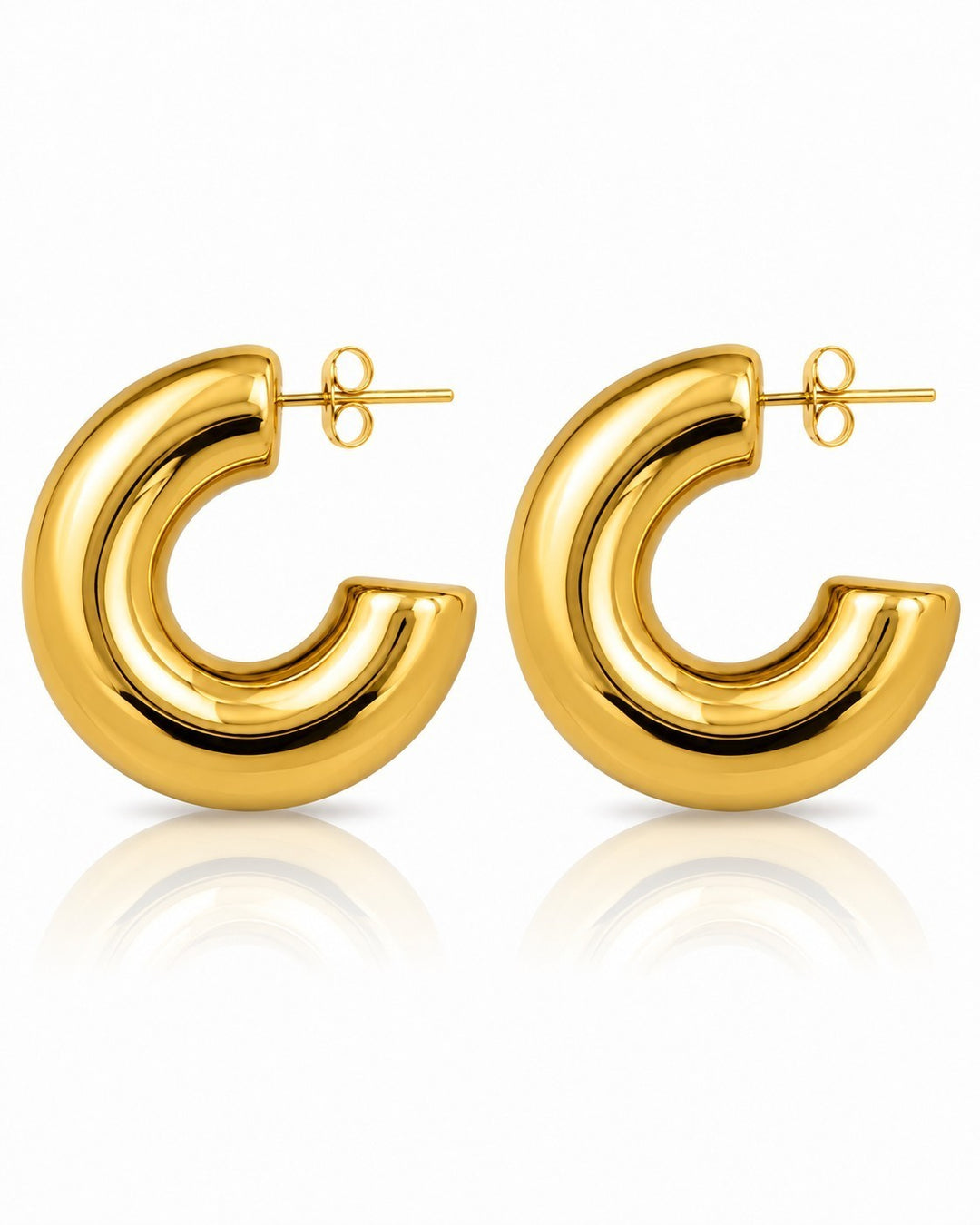 Elli Jewellery chunky C-shaped hoop earrings in polished gold-plated metal on a white background.