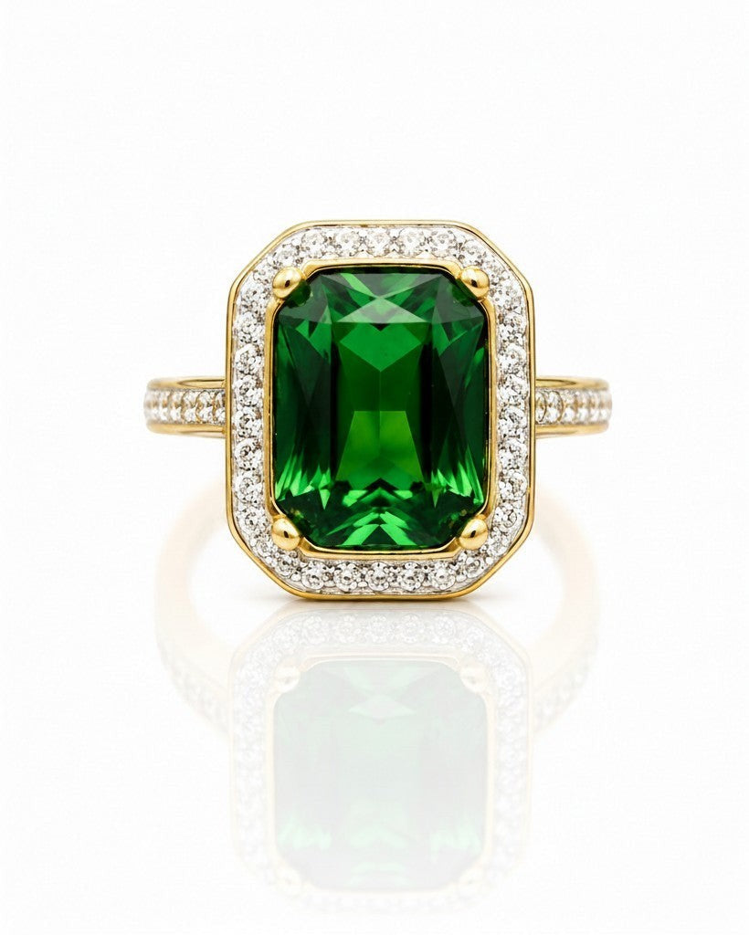 Elli Jewellery gold plated chunky ring featuring a large emerald green rectangular stone with a diamond halo setting.