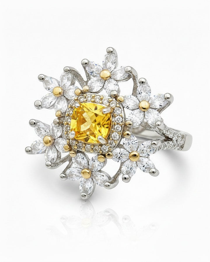 Elli Jewellery silver plated statement ring featuring a central yellow cubic zirconia stone surrounded by floral petals