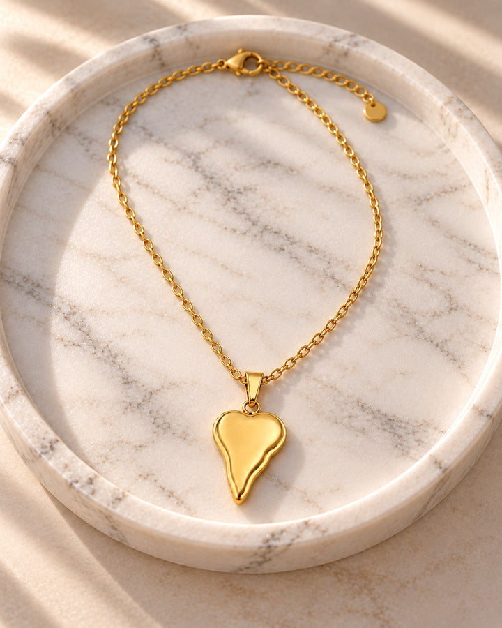 Elli Jewellery gold plated waterproof necklace featuring an asymmetric heart pendant on a delicate chain