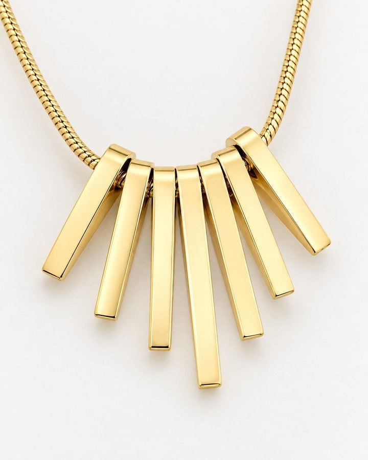 Elli Jewellery gold plated necklace featuring a fan-shaped pendant with six sleek vertical bar charms on a snake chain