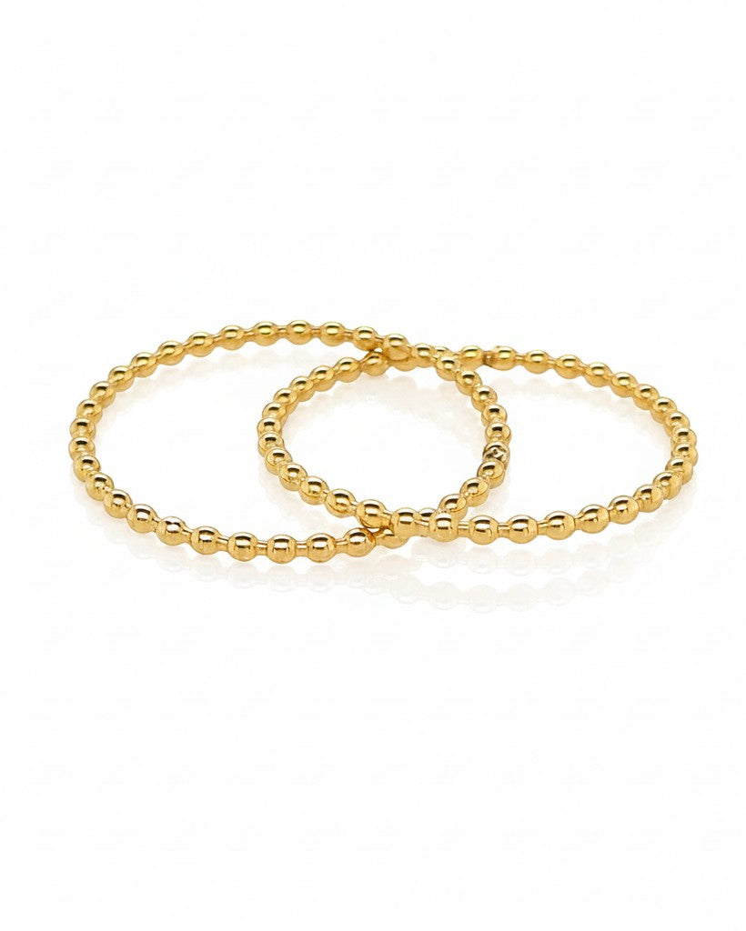 Elli Jewellery gold plated double stack ring with a delicate beaded texture design on a white background.
