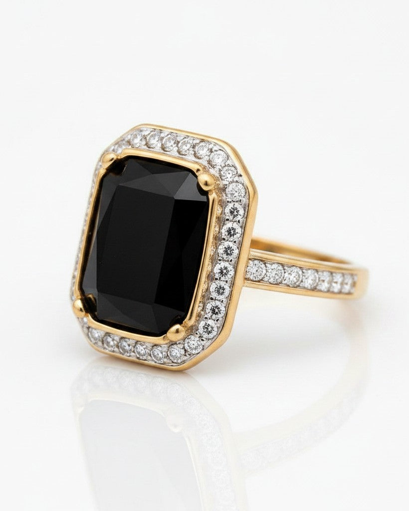 Elli Jewellery gold plated statement ring featuring a large rectangular black stone surrounded by a halo of crystals.