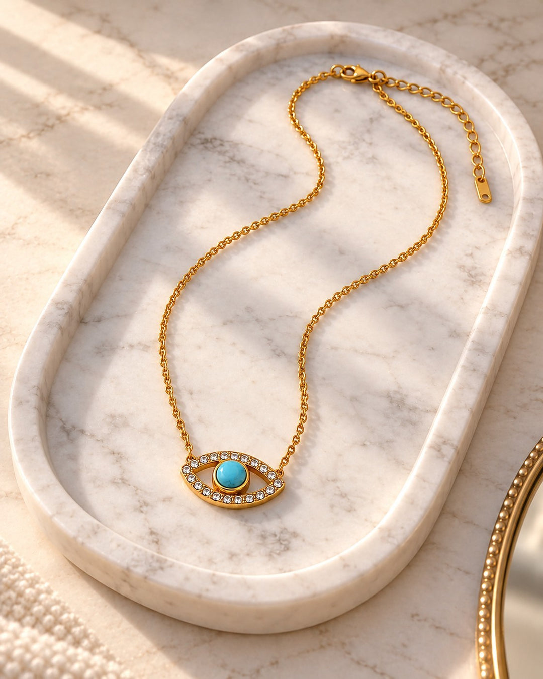 Elli Jewellery gold plated necklace featuring a blue crystal zirconia evil eye pendant on a delicate chain
