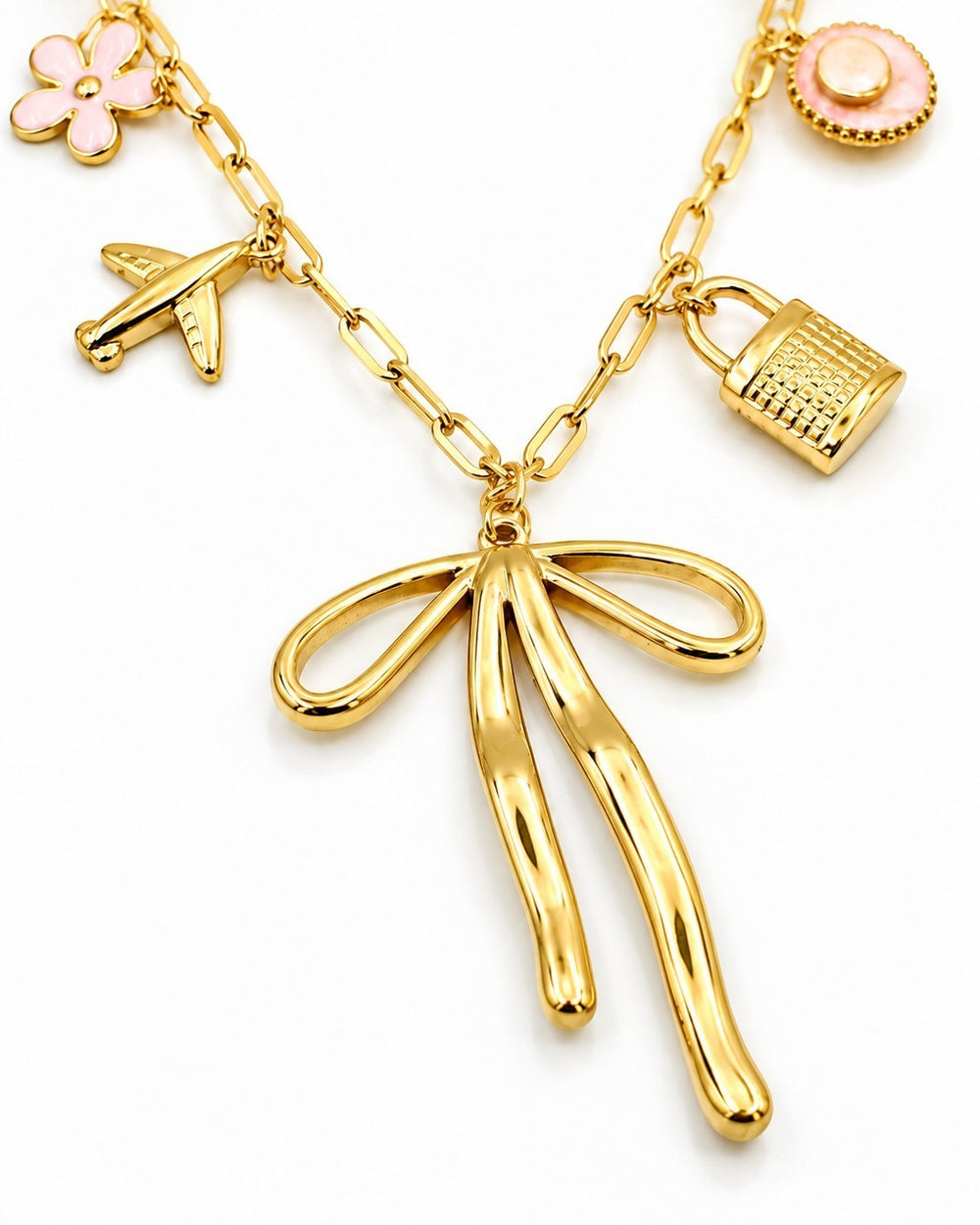 Elli Jewellery gold plated charm necklace featuring a ribbon bow, airplane, padlock, and pink flower charms.