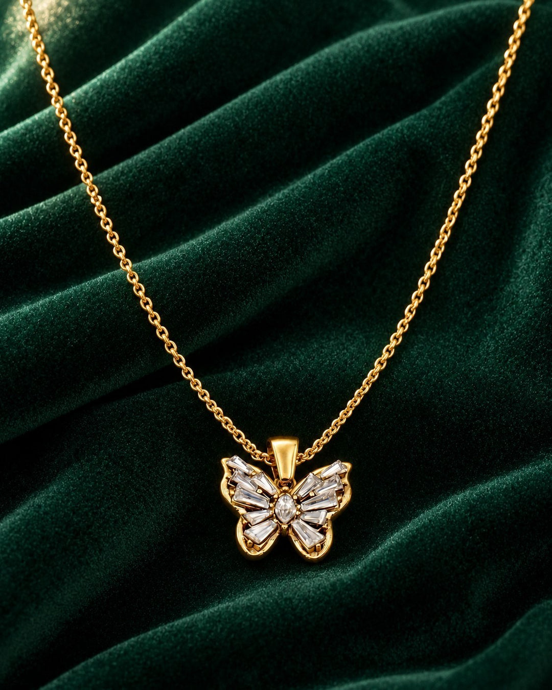 Elli Jewellery gold plated butterfly pendant necklace featuring sparkling cubic zirconia stones on a delicate chain