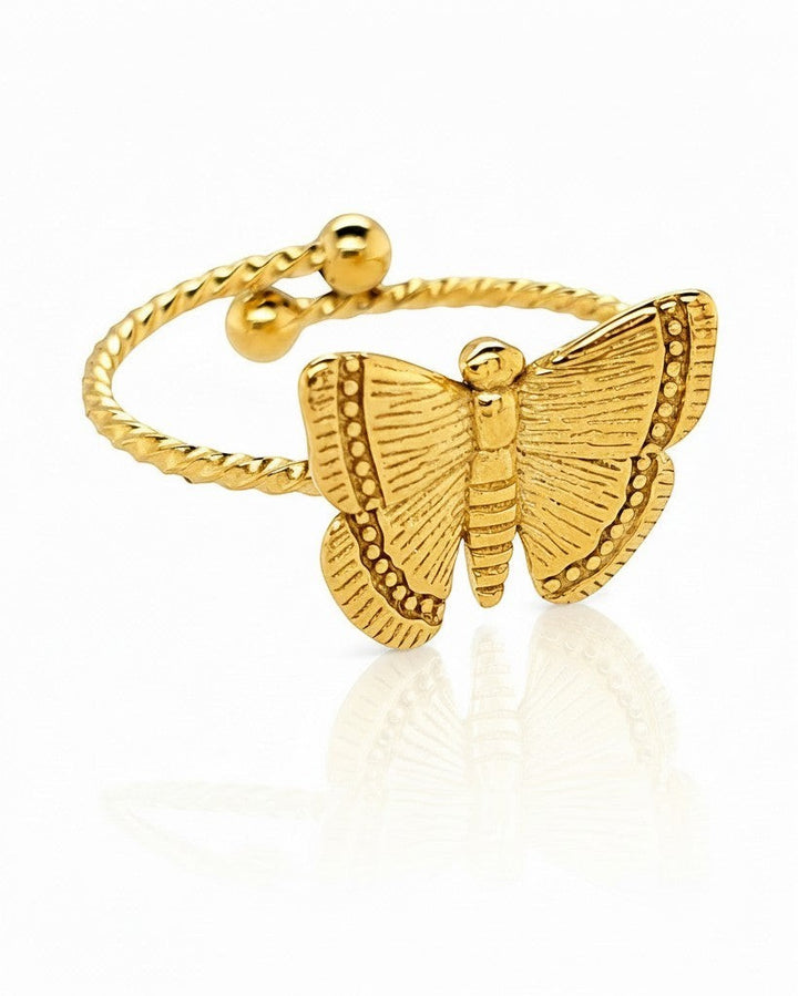 Elli Jewellery gold plated adjustable ring featuring a delicate open butterfly design with a twisted band.