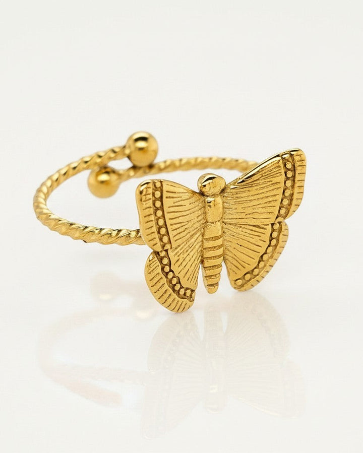 Elli Jewellery gold plated adjustable ring featuring a delicate open butterfly design with a twisted band.