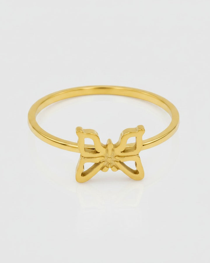 Elli Jewellery gold plated butterfly statement ring with a minimalist cutout design on a light background