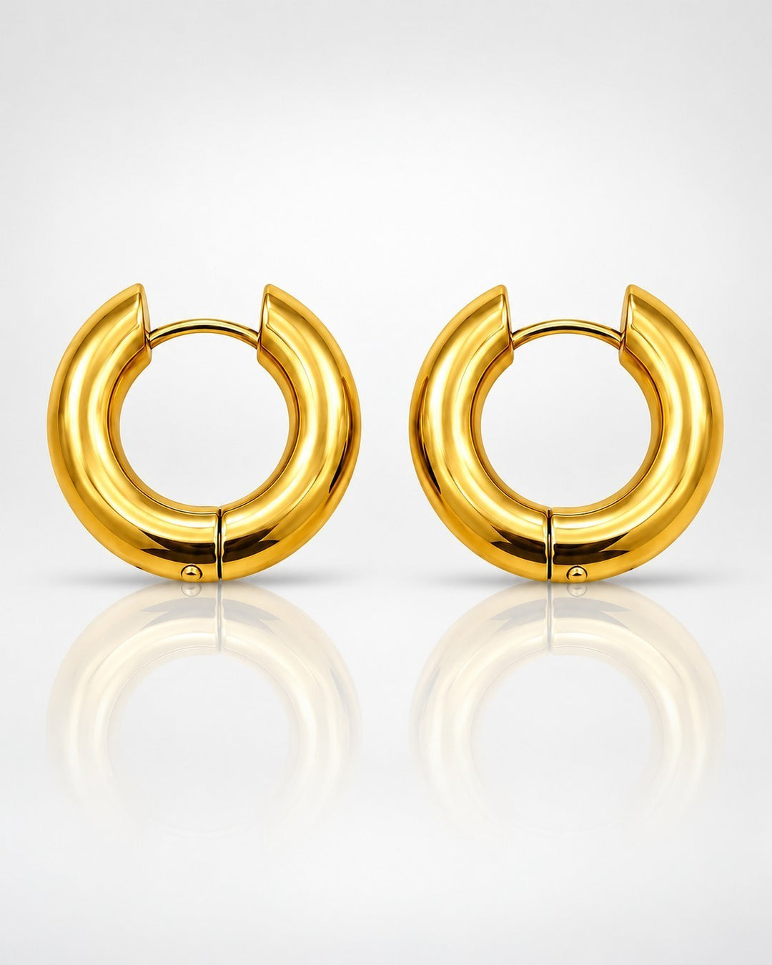 Elli Jewellery gold plated chunky hoop earrings with a polished finish and 2.5cm diameter for a modern statement look.