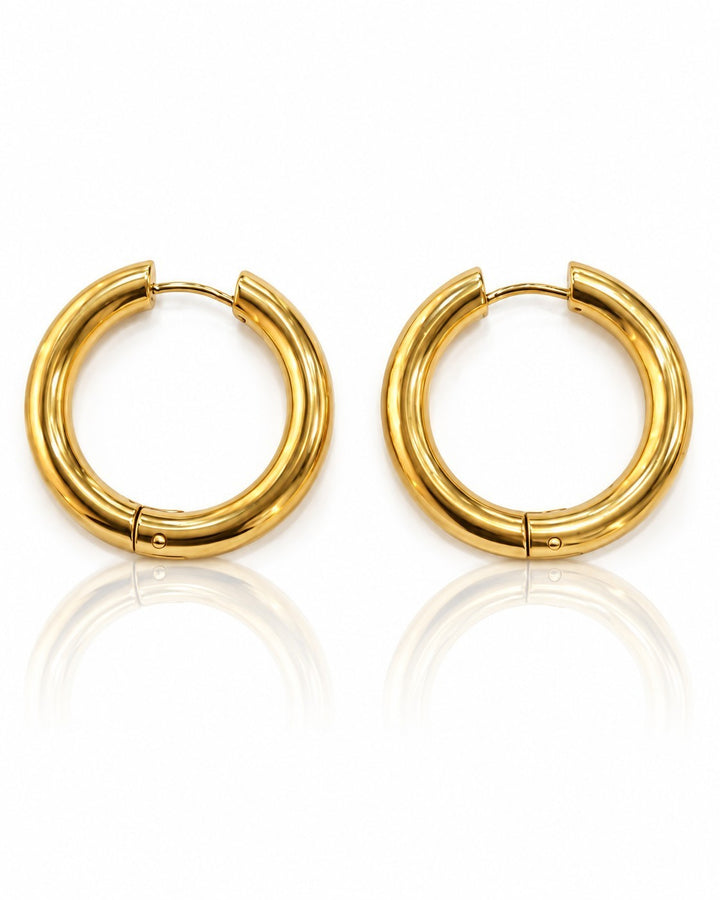 Elli Jewellery 3cm gold plated chunky hoop earrings with a polished textured surface finish on a white background.