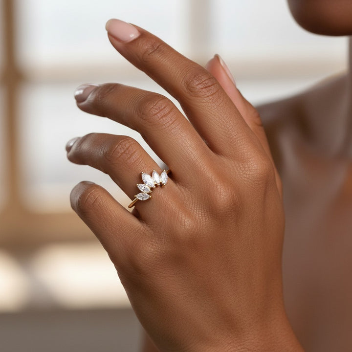 Elli Jewellery gold plated crown ring with marquise-cut stones worn on a finger