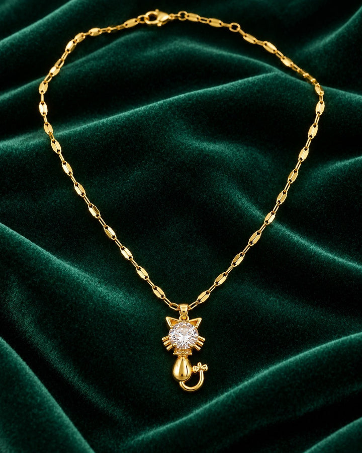Elli Jewellery gold plated cat pendant necklace with a sparkling crystal center on a delicate chain