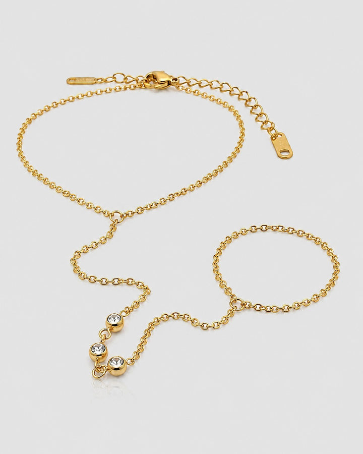 Elli Jewellery gold plated boho hand chain bracelet with delicate cable chain and three sparkling crystal accents