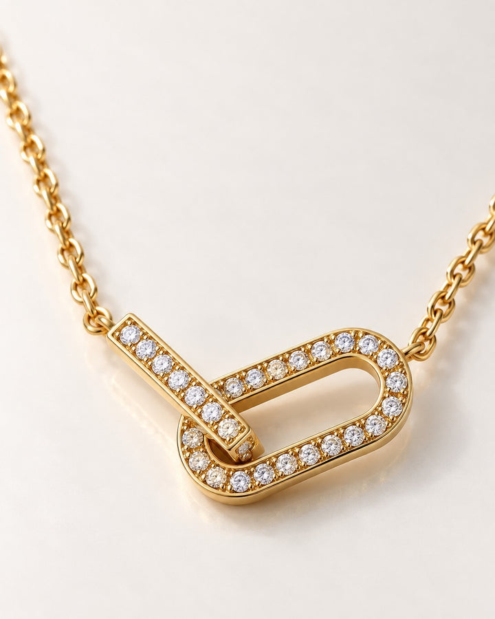 Elli Jewellery gold plated waterproof chunky link necklace featuring a crystal-encrusted oval clasp pendant.