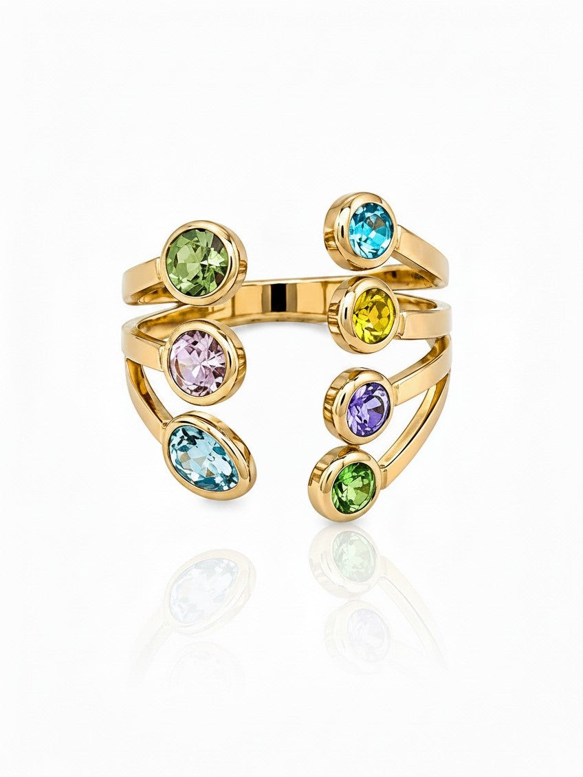 Elli Jewellery gold plated statement ring featuring seven vibrant bezel-set multi-coloured crystals in a spiral design.