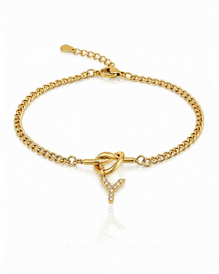 Elli Jewellery gold plated chain bracelet featuring a sparkling crystal-encrusted letter Y charm and knot detail.
