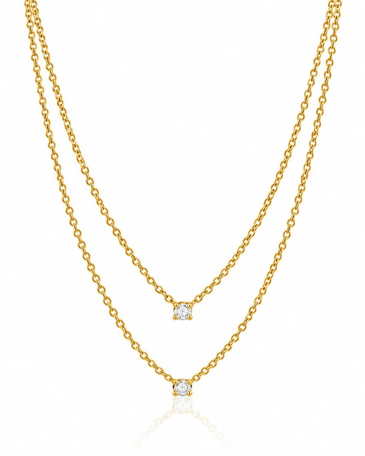 Elli Jewellery gold plated double chain necklace featuring two sparkling cubic zirconia crystal pendants