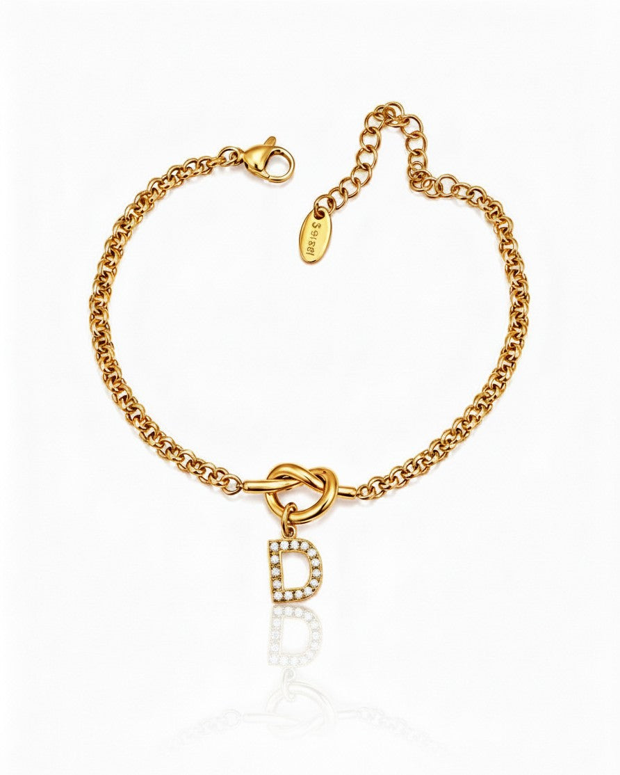 Elli Jewellery gold plated waterproof chain bracelet featuring a crystal diamante D initial charm and lobster clasp.