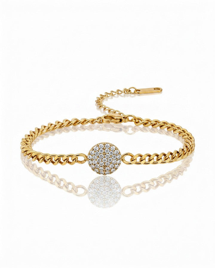 Elli Jewellery gold plated curb chain bracelet featuring a round diamanté encrusted pendant on a white background