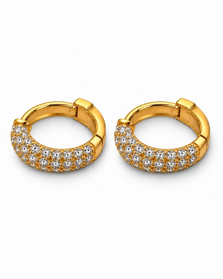 Elli Jewellery gold plated waterproof huggie hoop earrings featuring sparkling diamanté stones on a sleek frame.