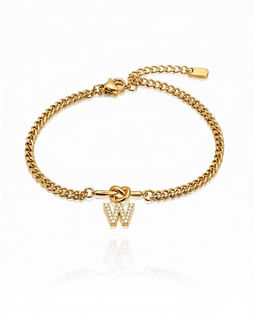 Elli Jewellery gold plated waterproof bracelet featuring a diamante-encrusted W initial charm on a delicate chain.