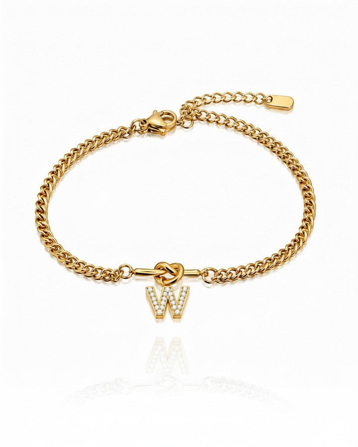 Elli Jewellery gold plated waterproof bracelet featuring a diamante-encrusted W initial charm on a delicate chain.