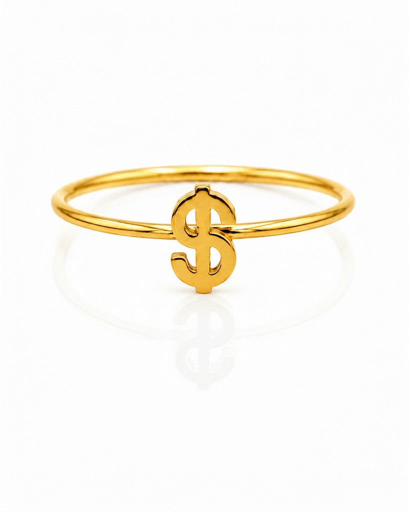 Elli Jewellery gold plated waterproof statement ring featuring a dollar sign symbol on a thin band