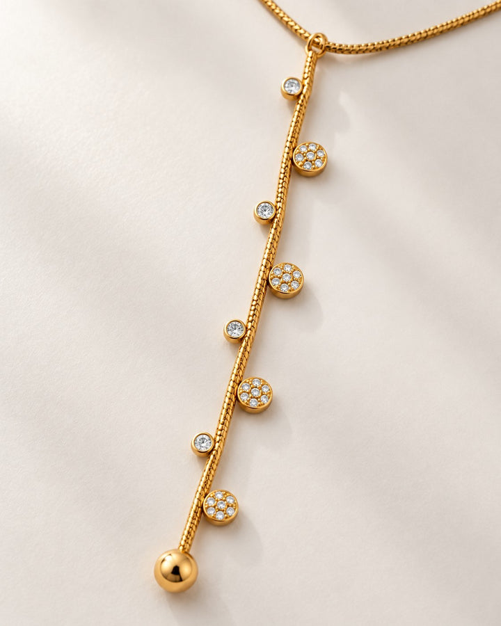 Elli Jewellery gold-plated dainty necklace featuring a delicate chain with sparkling crystal-studded dotted charms.
