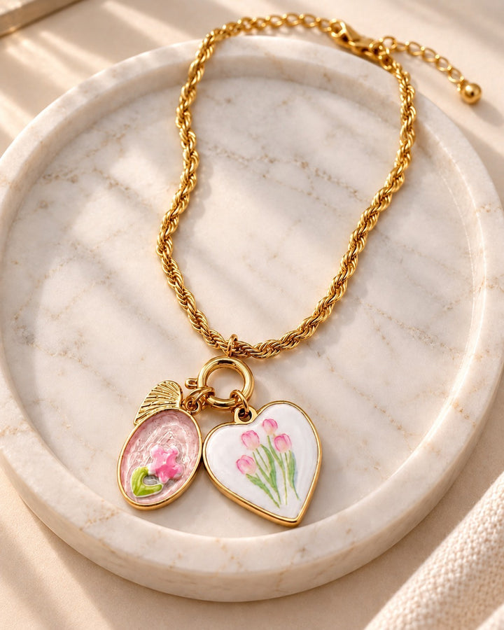 Elli Jewellery gold plated rope chain necklace featuring a heart pendant with floral tulip enamel detail