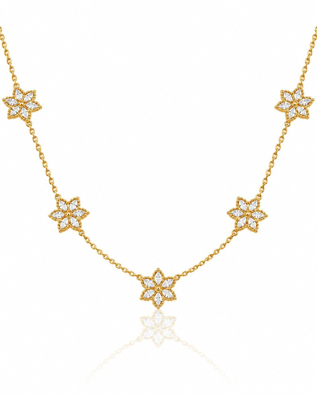 Elli Jewellery gold plated necklace featuring five delicate floral bloom pendants with clear crystal accents.