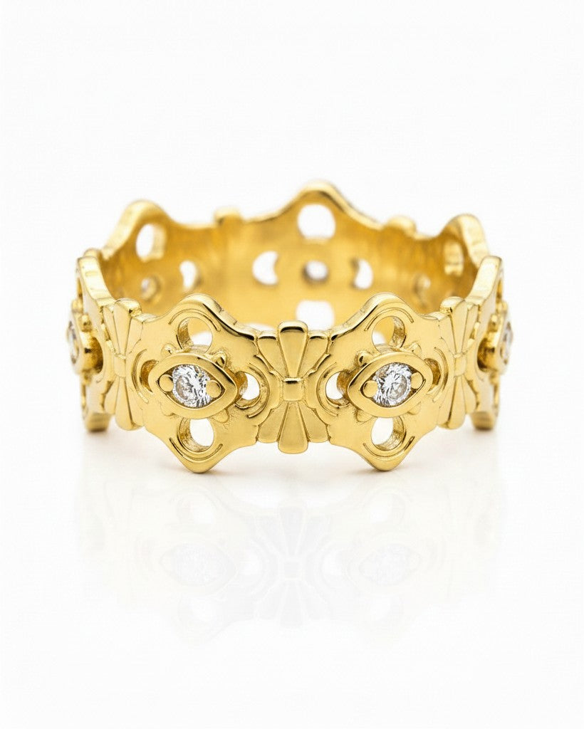 Elli Jewellery gold plated hollow floral statement ring with intricate cut-out details and embedded crystals.