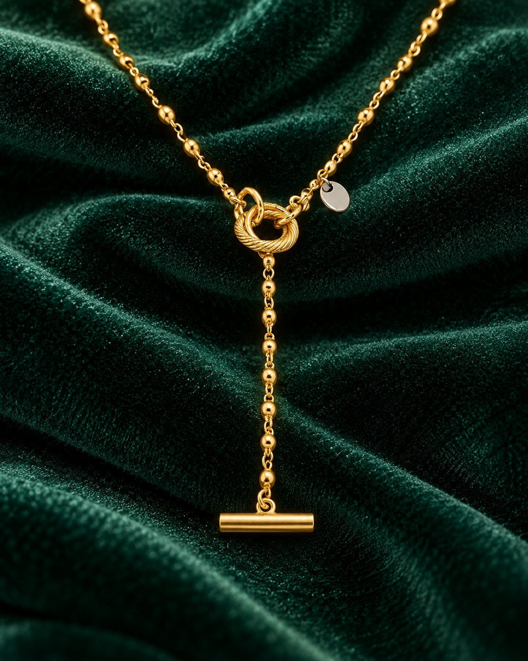 Elli Jewellery gold plated waterproof necklace with a geometric circle and bar pendant on a beaded chain