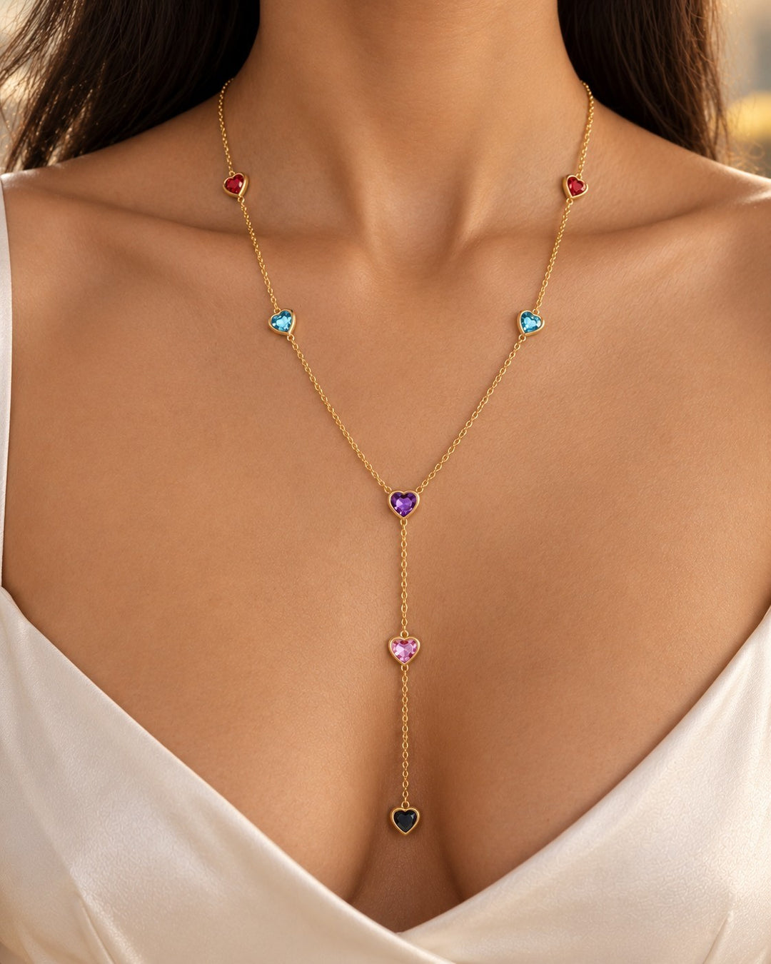 Elli Jewellery gold-plated Y-shaped necklace featuring colourful heart-shaped beads on a delicate chain