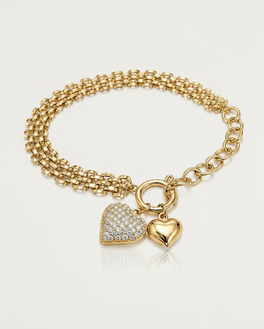 Elli Jewellery gold plated chain bracelet featuring a pavé heart charm and a polished gold heart charm.