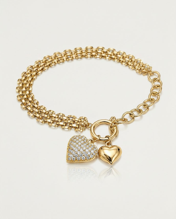 Elli Jewellery gold plated chain bracelet featuring a pavé heart charm and a polished gold heart charm.