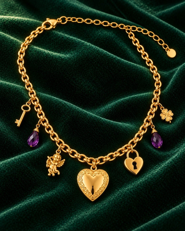 Elli Jewellery gold plated charm necklace featuring a heart locket, purple crystals, and cupid on green velvet.
