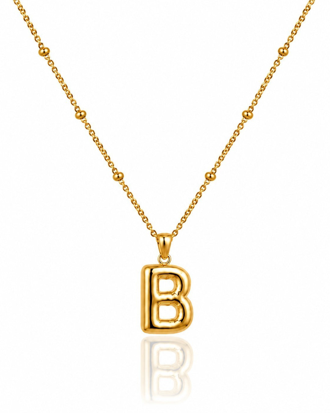 Elli Jewellery gold plated chunky initial B pendant necklace on a delicate beaded chain against a white background