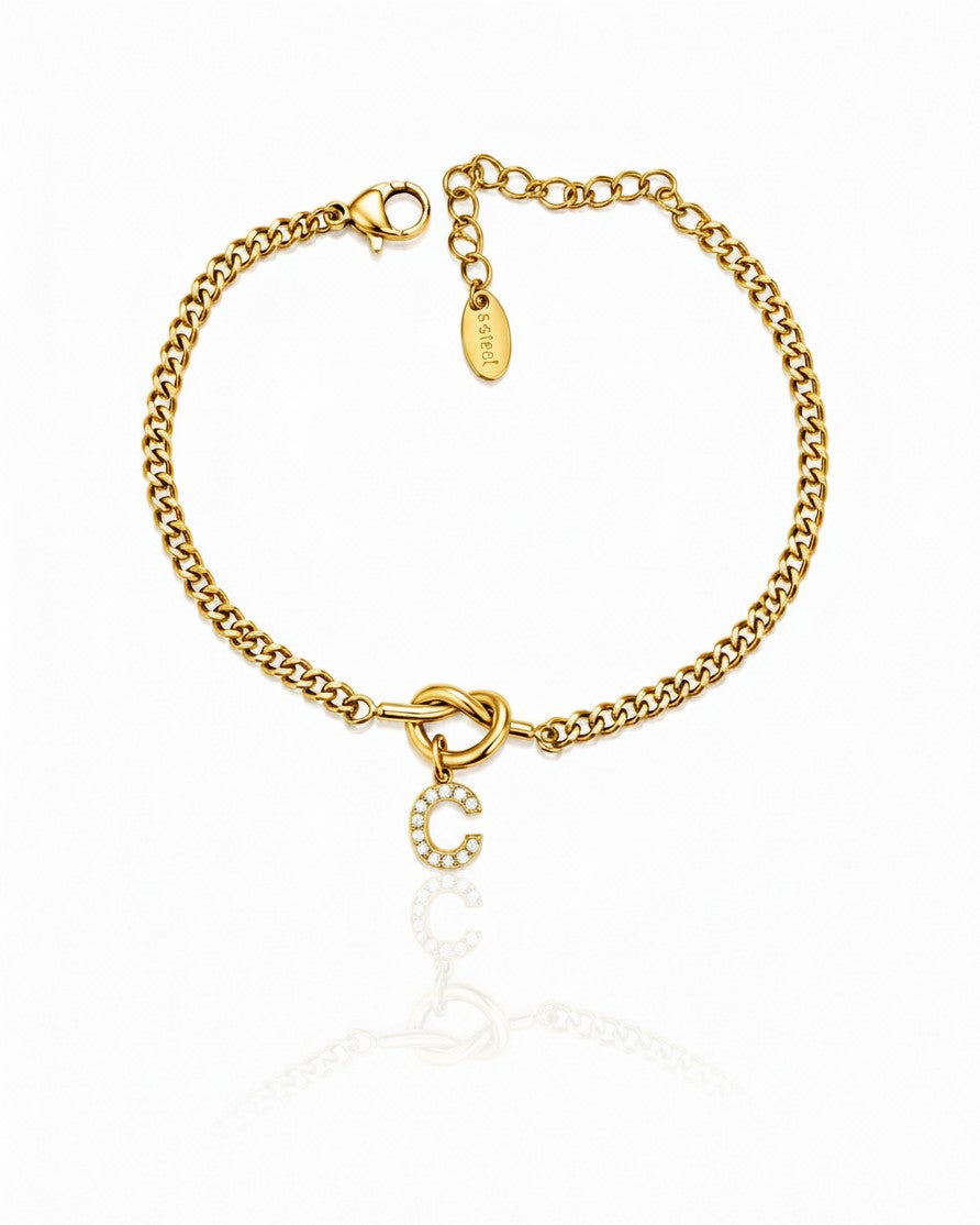 Elli Jewellery gold plated chain bracelet featuring a sparkling diamanté C initial charm and a secure lobster clasp.