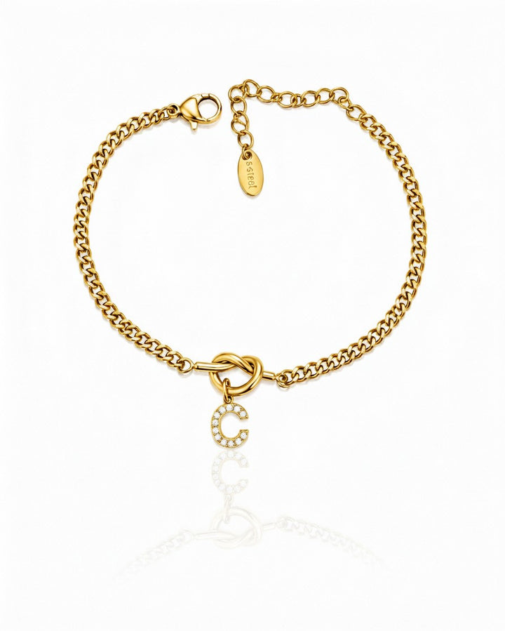 Elli Jewellery gold plated chain bracelet featuring a sparkling diamanté C initial charm and a secure lobster clasp.