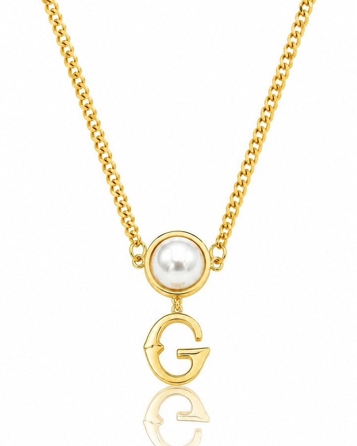 Elli Jewellery gold plated curb chain necklace featuring a white pearl accent and a bold letter G pendant