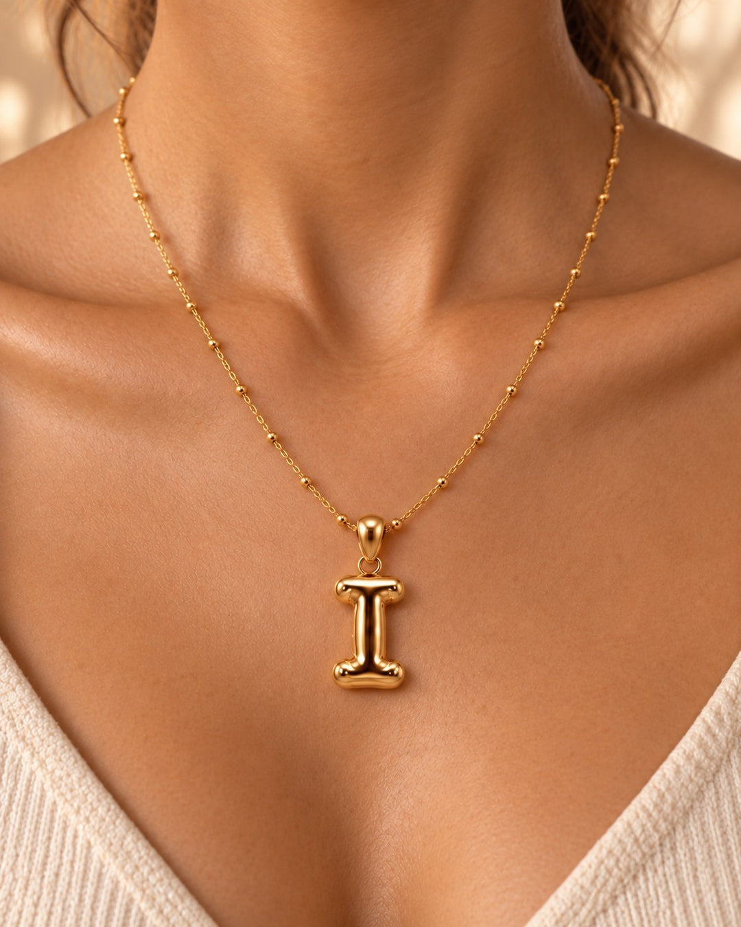 Elli Jewellery gold plated waterproof chunky initial I pendant necklace on a delicate beaded chain