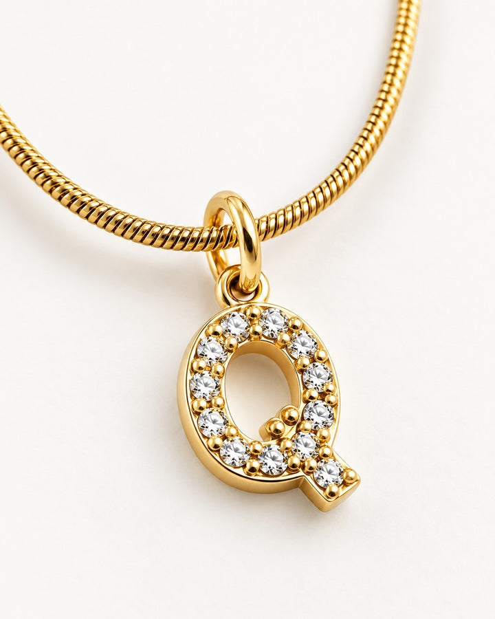 Elli Jewellery gold plated initial Q pendant necklace featuring sparkling crystals on a delicate snake chain
