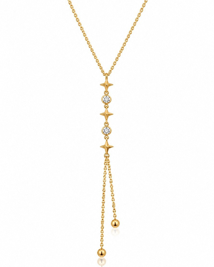 Elli Jewellery gold plated lariat necklace featuring star charms, clear crystals, and delicate dangling ball chains.