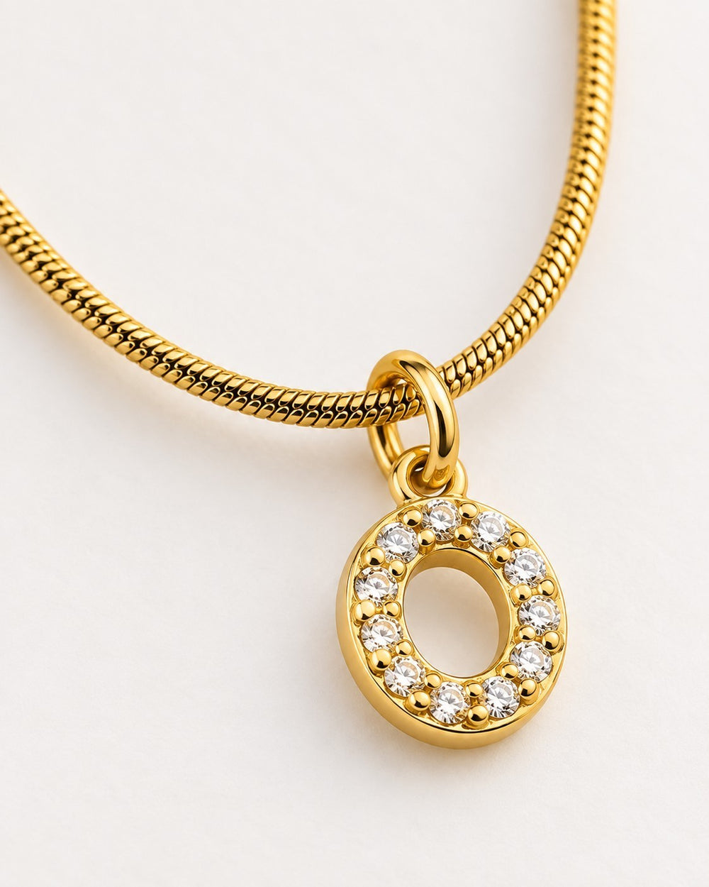 Elli Jewellery gold plated waterproof initial letter O pendant necklace with sparkling crystals on a snake chain